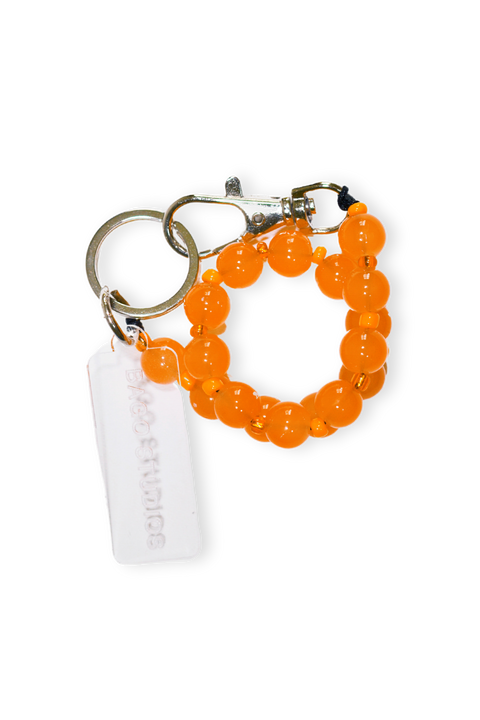 Oruga Charm - Naranja